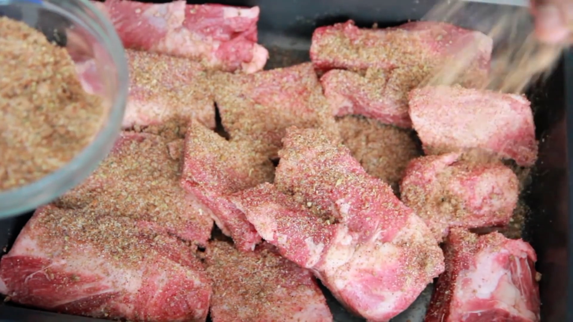 Beef ribs seasoned generously