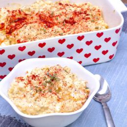 Creamy Southern potato salad recipe in a bowl with paprika