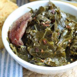 a bowl of savory collard greens with smoked turkey