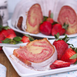 moist strawberry cream cheese pound cake on a plate